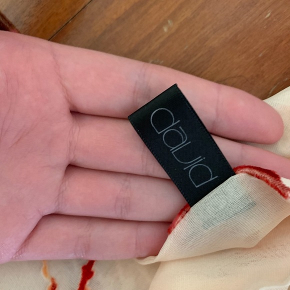 Cream scarf with red velvet detailing. - Picture 4 of 6